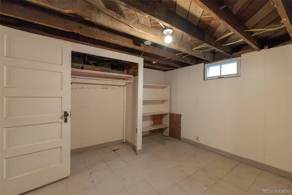 a bathroom with a toilet and shower
