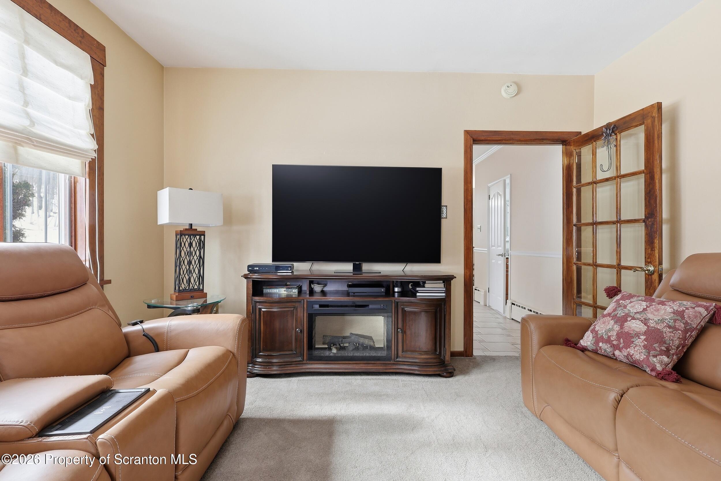 143 Old Boston Road Pittston, PA 18640 - Photo 20 of 61 a living room with furniture and a flat screen tv