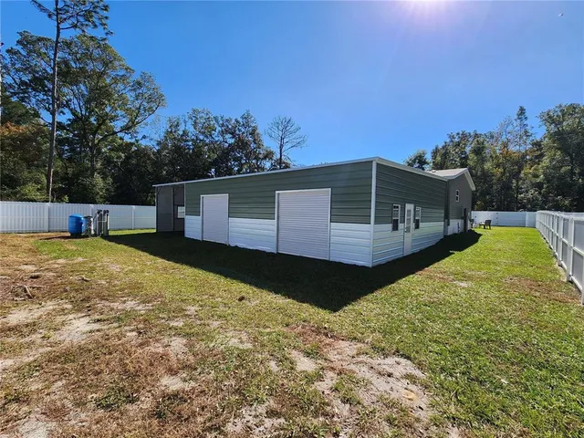 a view of a backyard with a garden