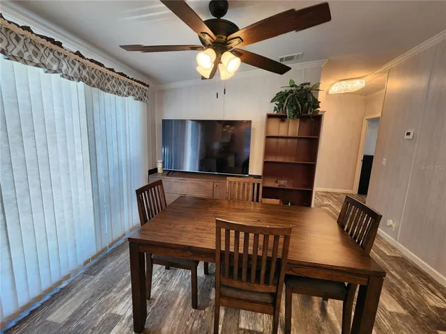 a view of a dining room with furniture