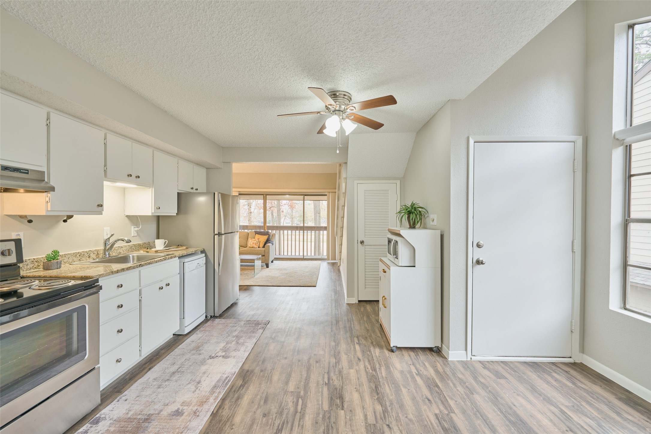 12900 Walden Road, Unit 602F Montgomery, TX 77356 - Photo 2 of 26 You will feel right at home in this partially furnished condo. Beautiful luxury vinyl ffloors are downstairs
