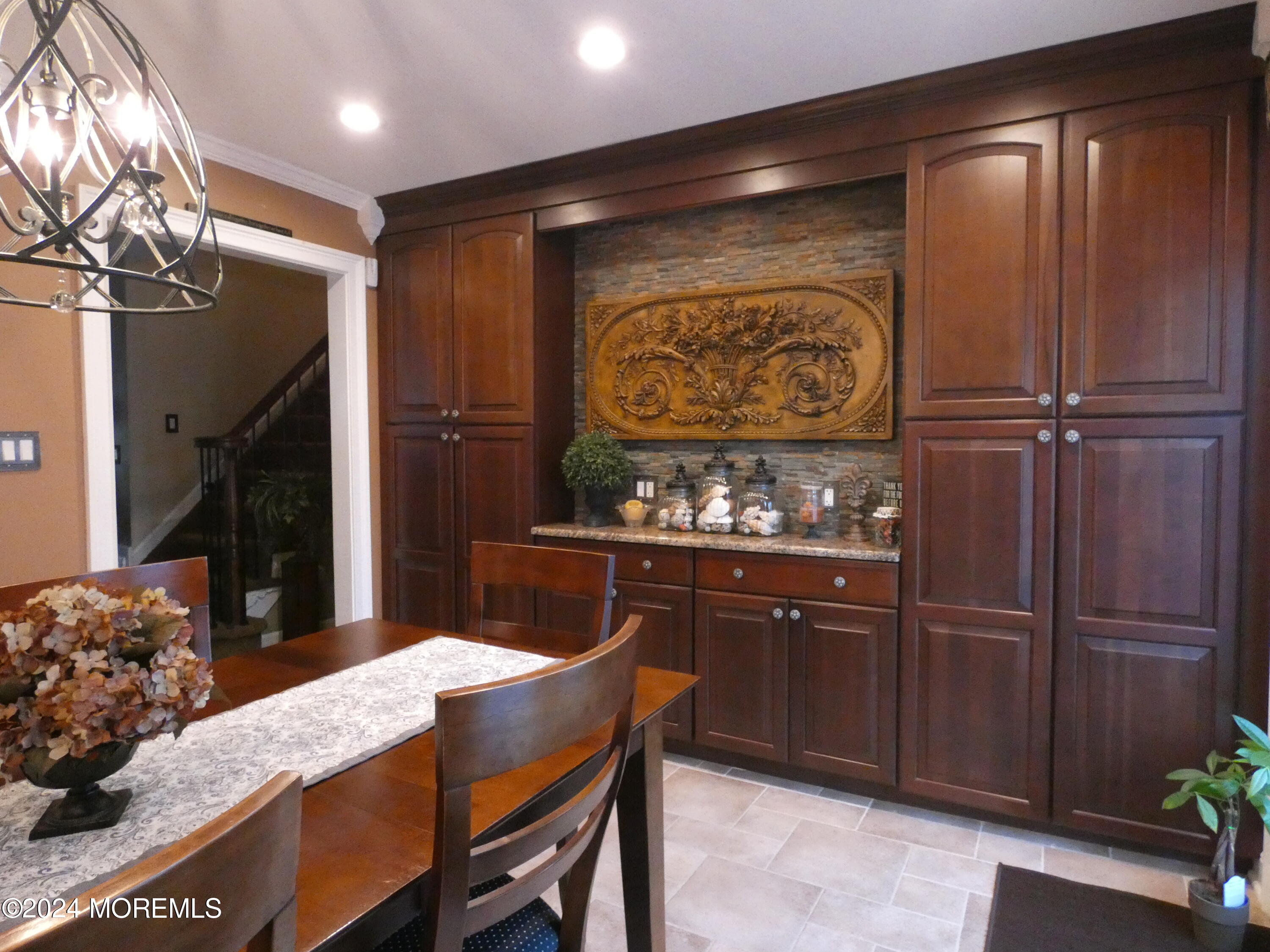 3 Springhill Drive Howell, NJ 07731 - Photo 11 of 37 a kitchen with stainless steel appliances granite countertop a sink refrigerator and cabinets