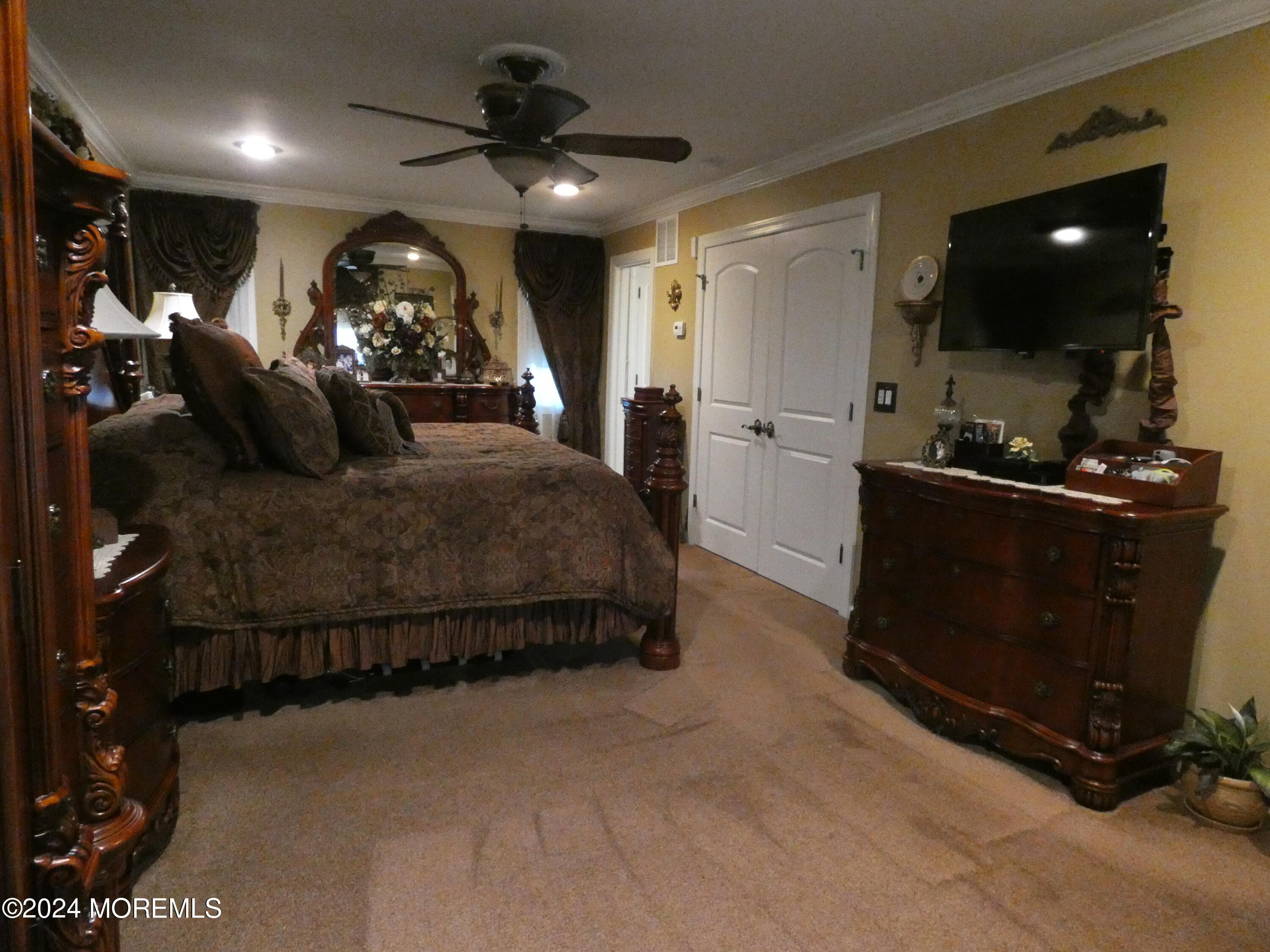 3 Springhill Drive Howell, NJ 07731 - Photo 20 of 37 a bed room with a bed and a television