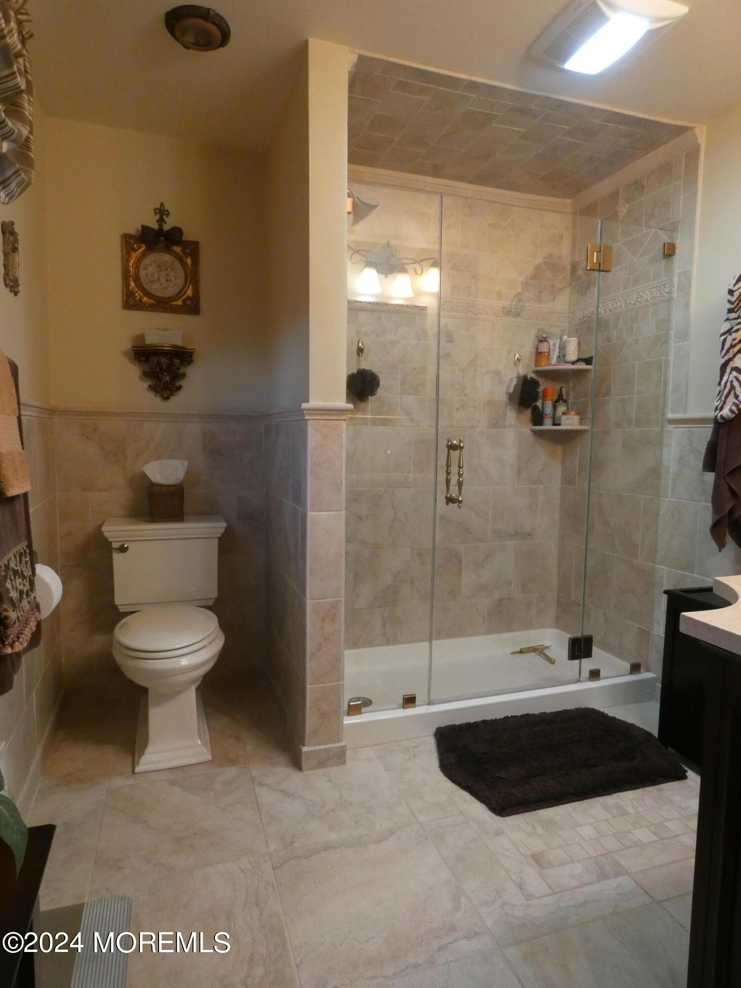 3 Springhill Drive Howell, NJ 07731 - Photo 22 of 37 a bathroom with a toilet a sink and shower