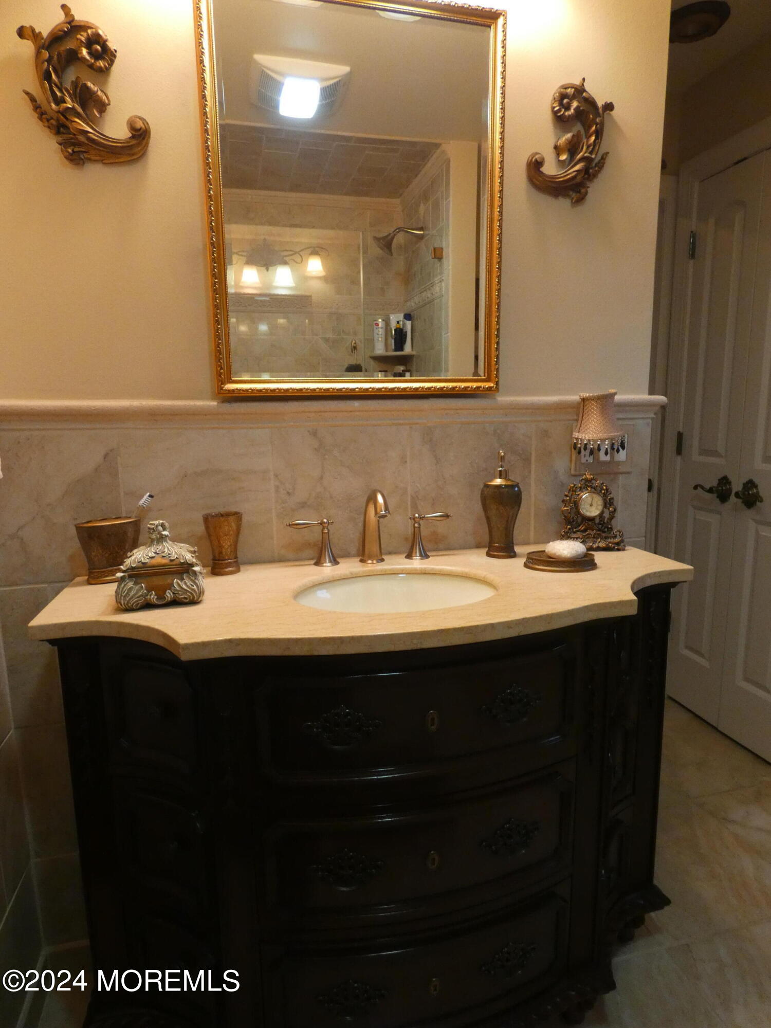 3 Springhill Drive Howell, NJ 07731 - Photo 23 of 37 a bathroom with a sink and a mirror