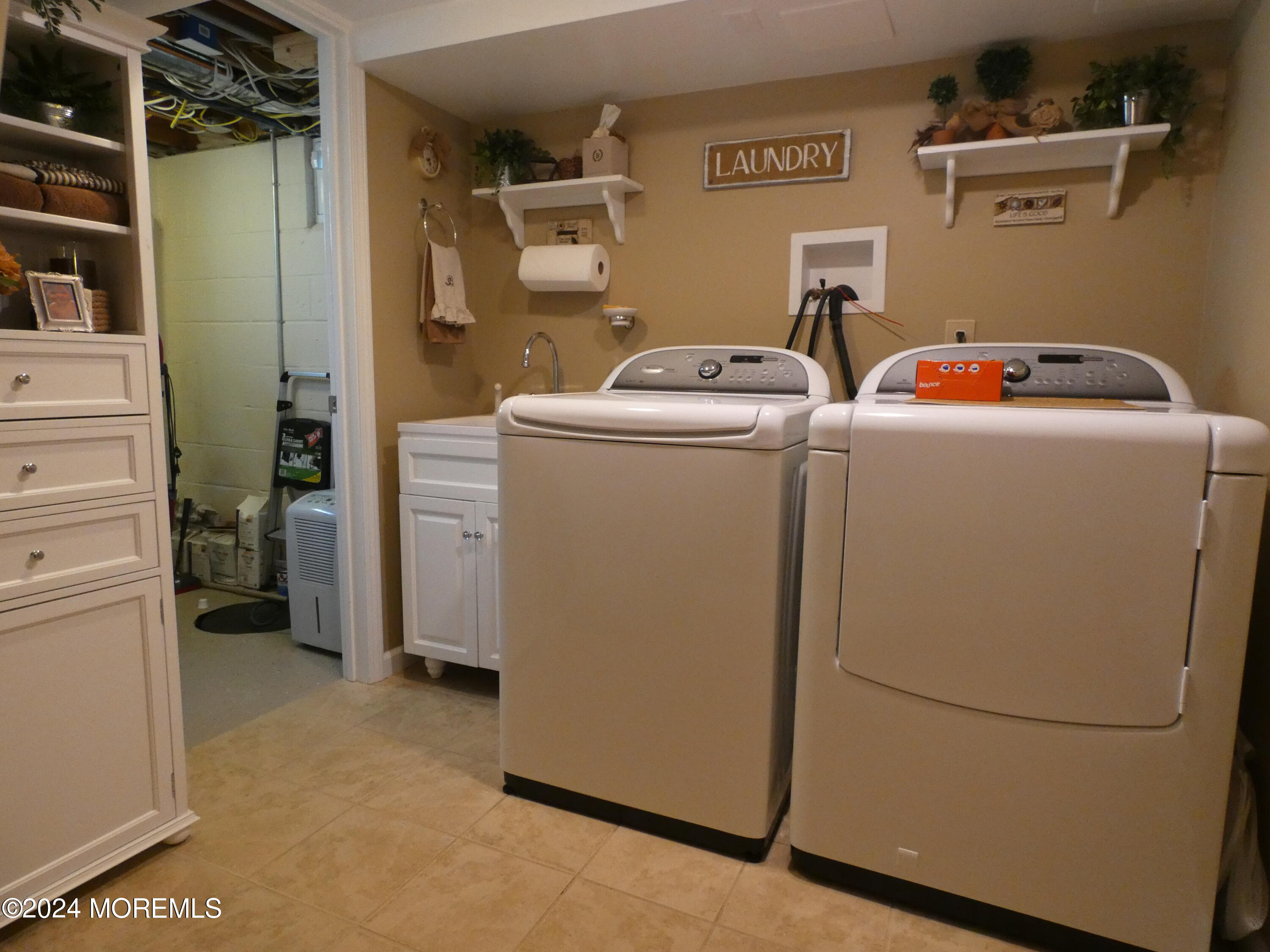 3 Springhill Drive Howell, NJ 07731 - Photo 31 of 37 a utility room with dryer and washer