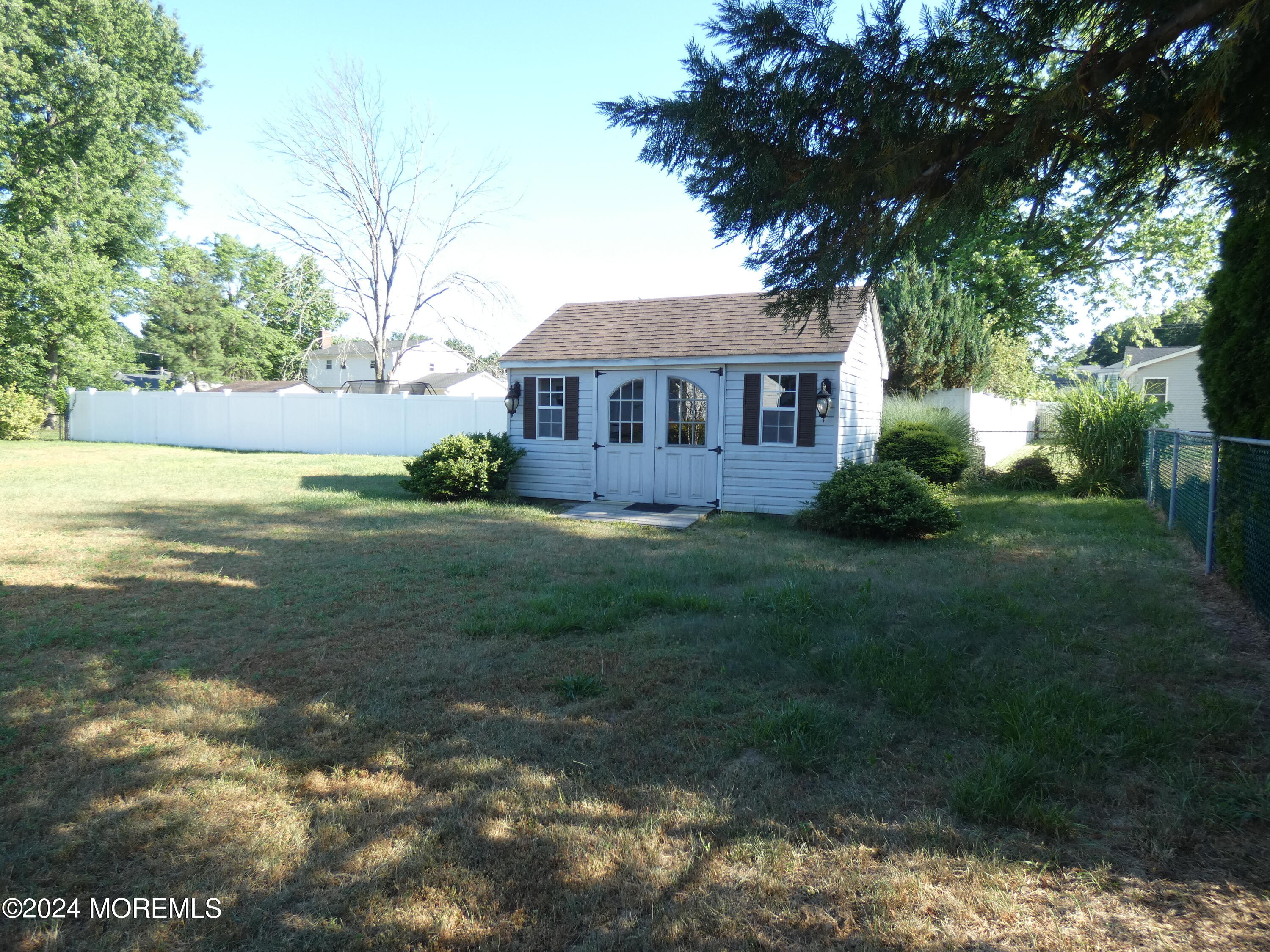 3 Springhill Drive Howell, NJ 07731 - Photo 34 of 37 a view of backyard of house with green space