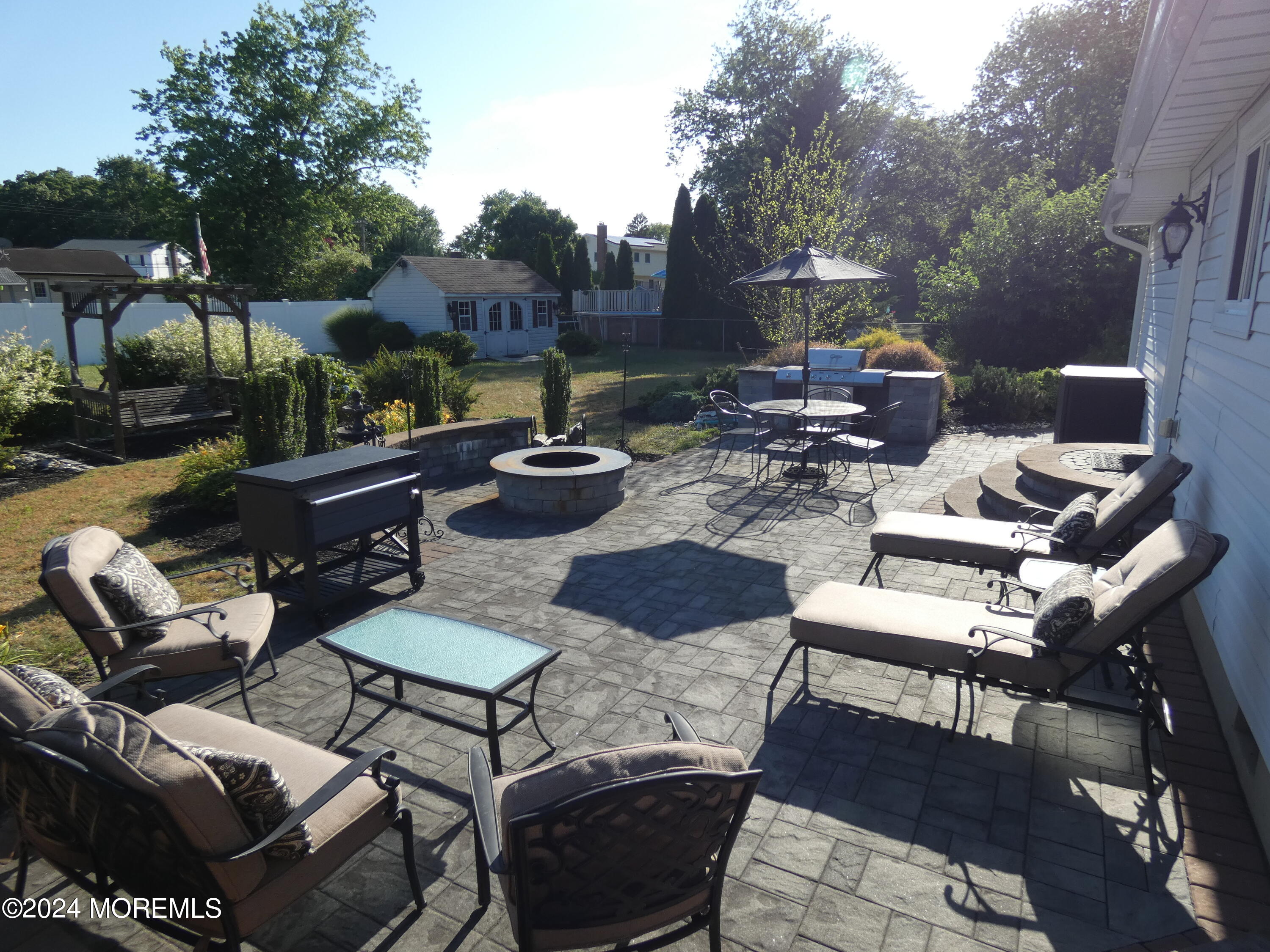 3 Springhill Drive Howell, NJ 07731 - Photo 36 of 37 a view of a patio with chairs and a table