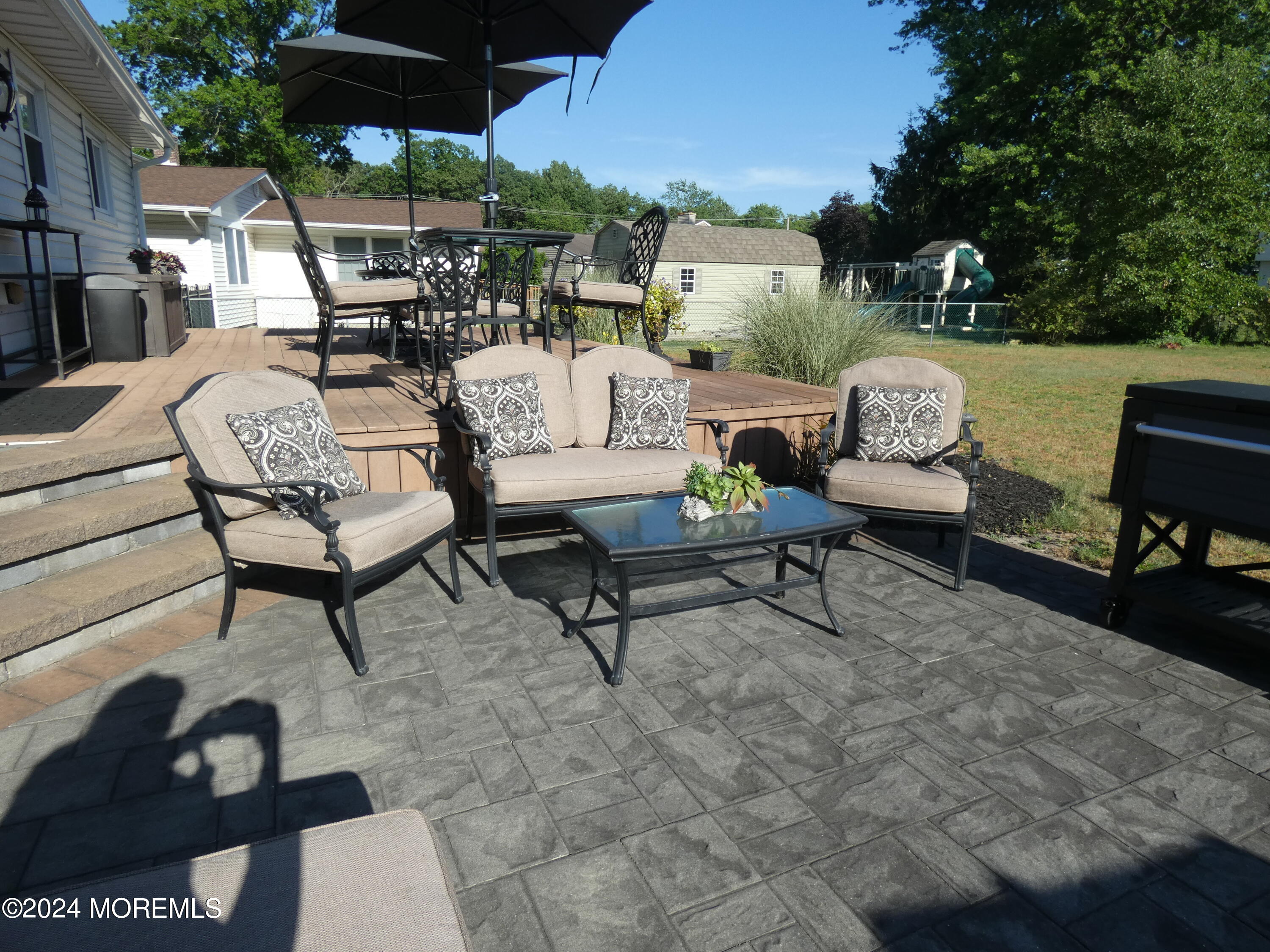 3 Springhill Drive Howell, NJ 07731 - Photo 37 of 37 a building outdoor space with patio couch and chairs