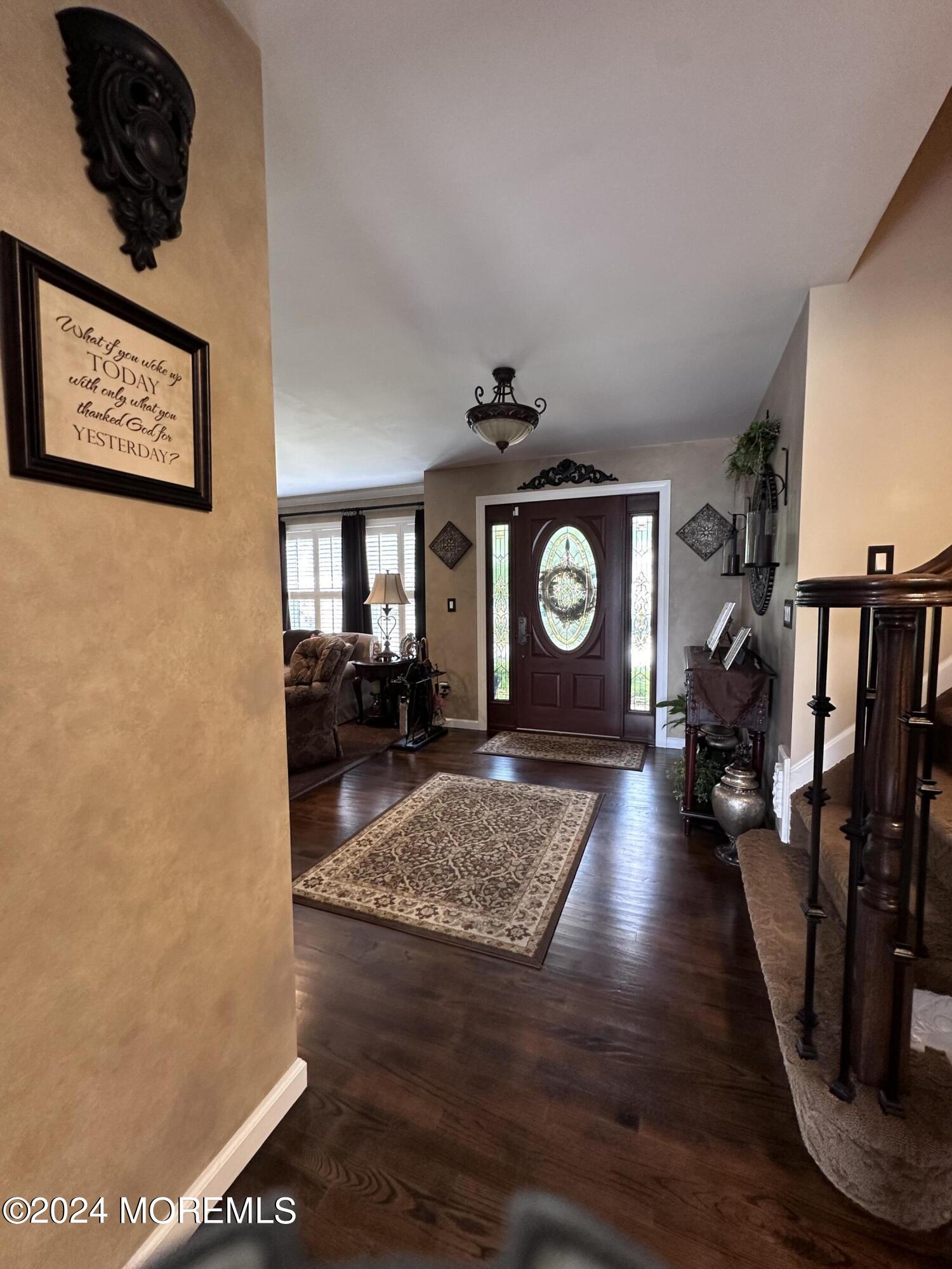 3 Springhill Drive Howell, NJ 07731 - Photo 4 of 37 a view of living room and wooden floor