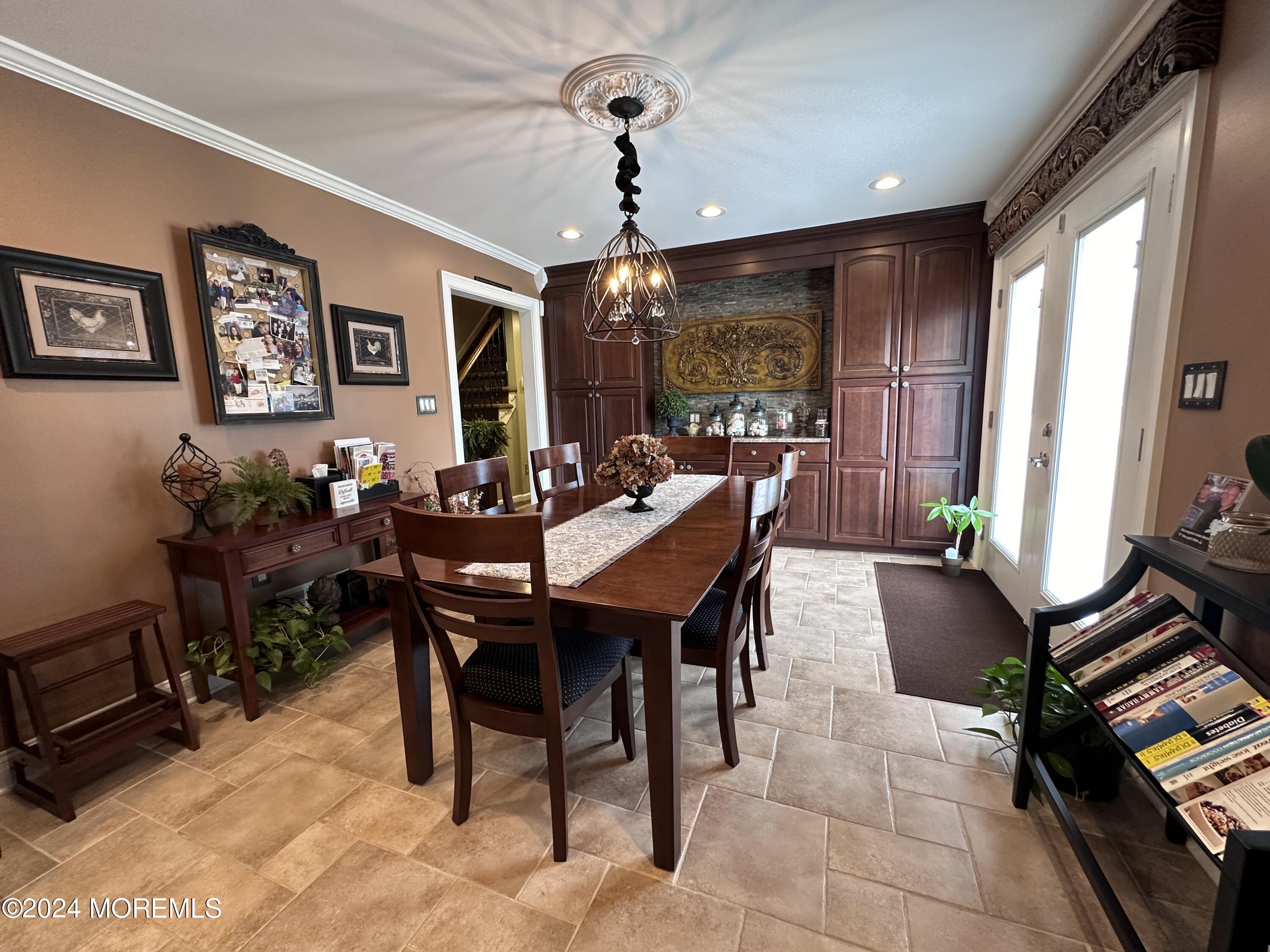3 Springhill Drive Howell, NJ 07731 - Photo 9 of 37 a view of a dining room with furniture window and outside view