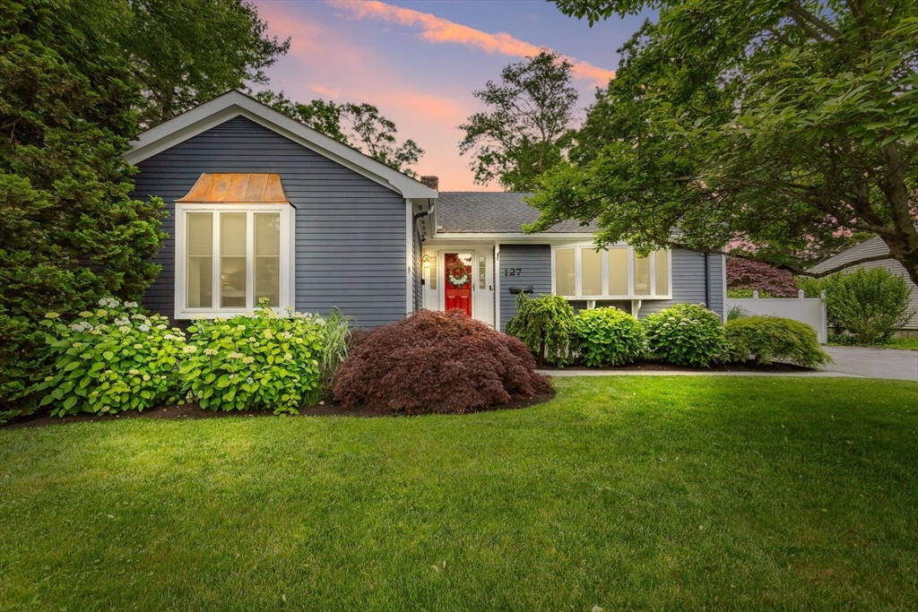127 Howland Road Fairhaven, MA 02719 - Photo 1 of 42 a house view with a garden space