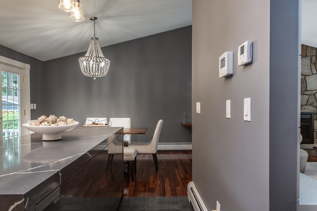 127 Howland Road Fairhaven, MA 02719 - Photo 14 of 42 a view of a dining room with furniture