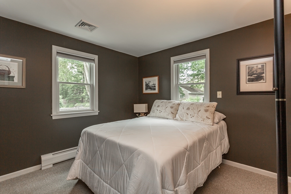 127 Howland Road Fairhaven, MA 02719 - Photo 23 of 42 a bedroom with a bed and a window