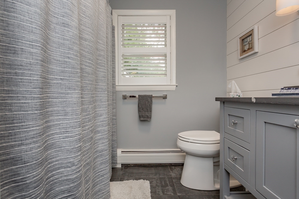 127 Howland Road Fairhaven, MA 02719 - Photo 26 of 42 a bathroom with a sink and a toilet