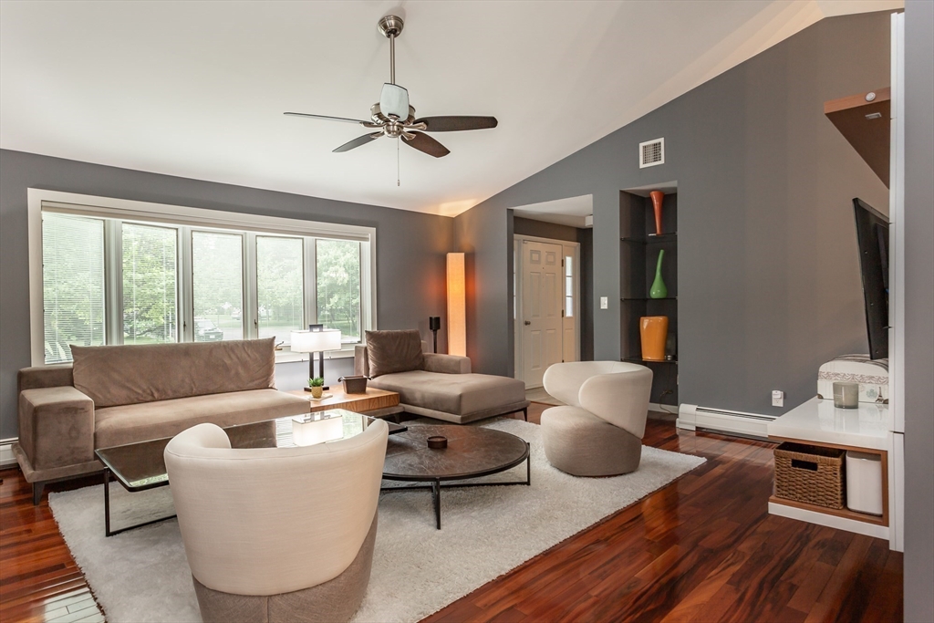 127 Howland Road Fairhaven, MA 02719 - Photo 3 of 42 a living room with furniture and a large window