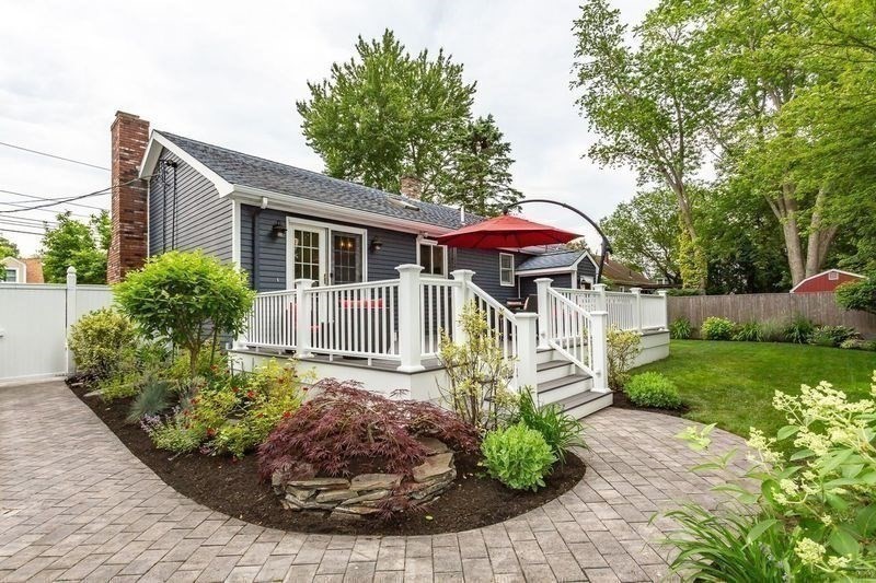 127 Howland Road Fairhaven, MA 02719 - Photo 39 of 42 a front view of a house with garden