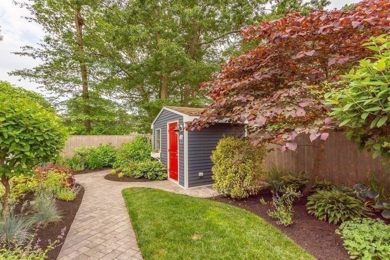 127 Howland Road Fairhaven, MA 02719 - Photo 40 of 42 a pathway of a house with a yard