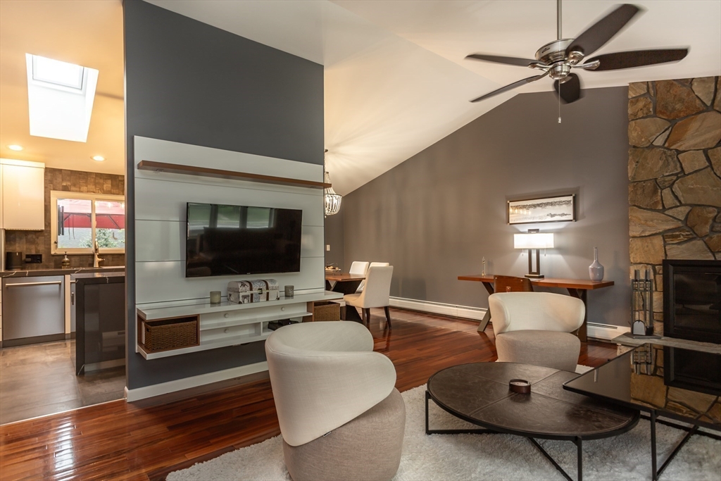 127 Howland Road Fairhaven, MA 02719 - Photo 6 of 42 a living room with furniture and a flat screen tv