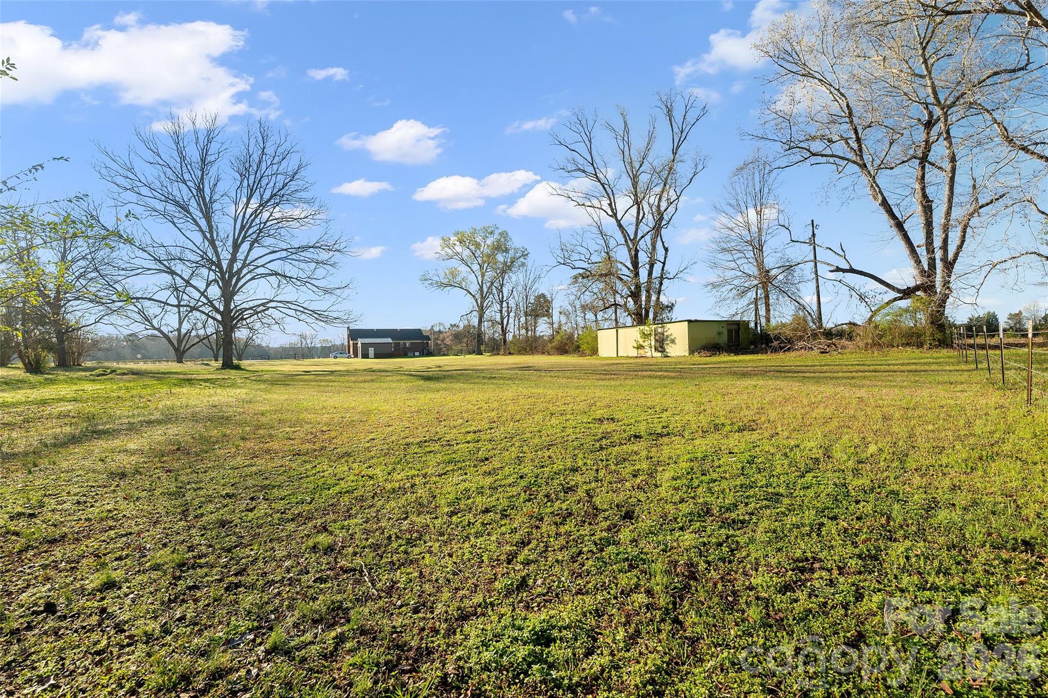 871 Saluda Road Chester, SC 29706 - Photo 38 of 46 a view of a swimming pool with an outdoor space and seating area