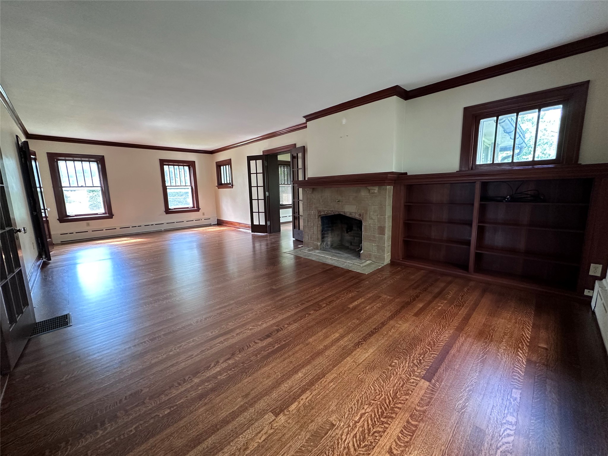 515 Hilltop Road Erie, PA 16509 - Photo 7 of 45 This 30'ft living room features newly refinished Oak floors.