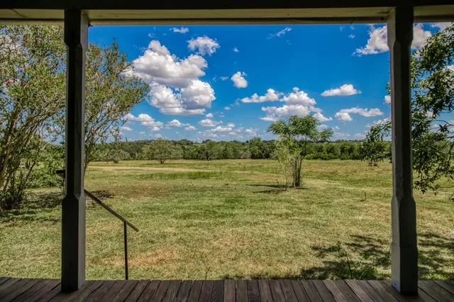 a view of a lake from a balcony