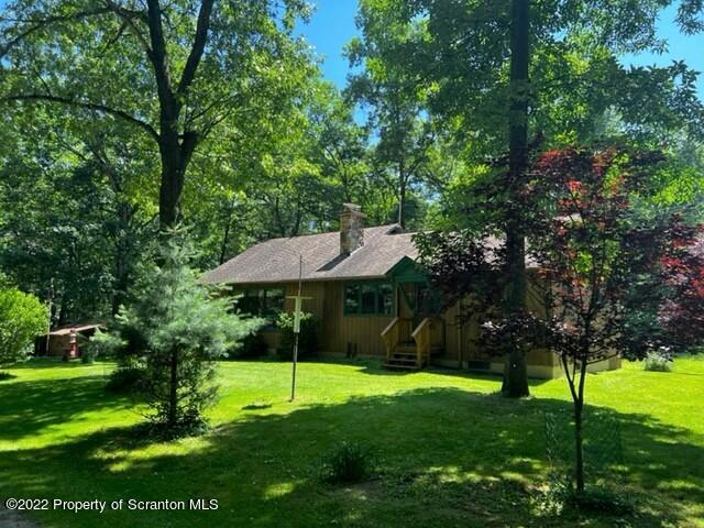 17 Center Road Hawley, PA 18428 - Photo 38 of 38 a view of a backyard with a garden
