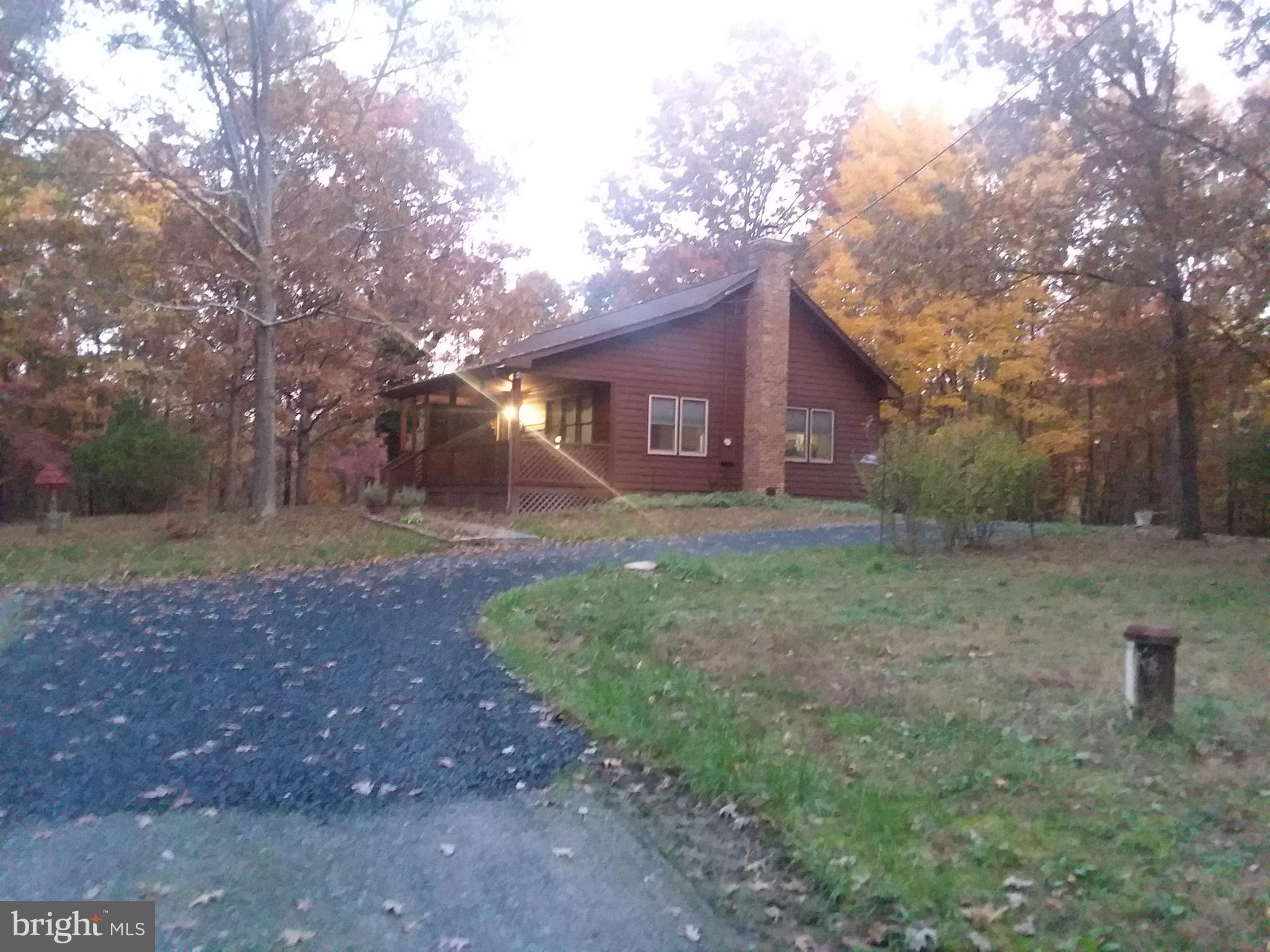 BEAUTIFUL CEDAR SIDING HOME ON 10 ACRES!