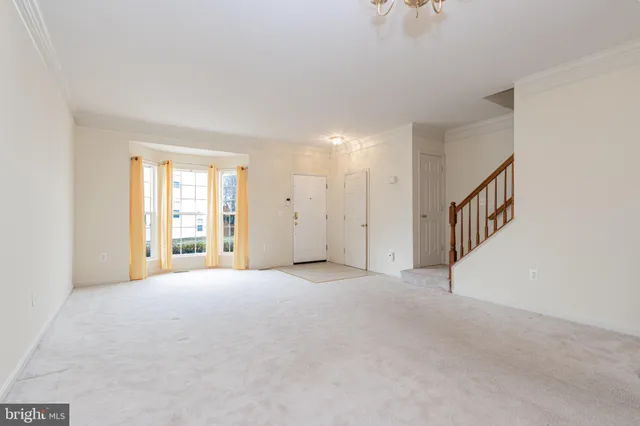 a view of a livingroom with a staircase