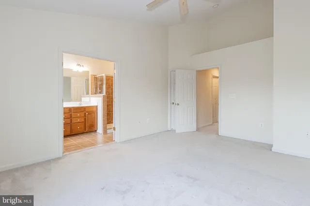 an empty room with a bathroom