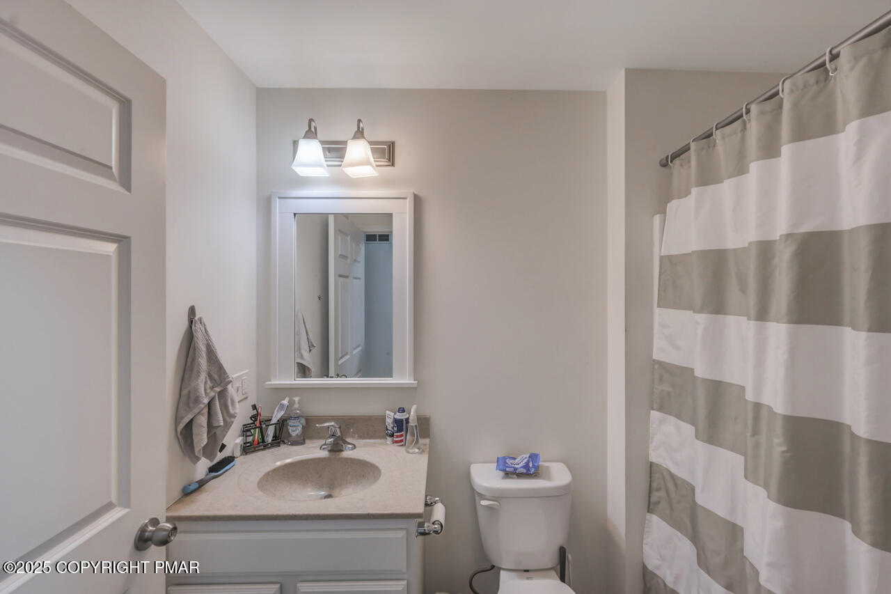 207 Game Lane Blakeslee, PA 18610 - Photo 37 of 55 a bathroom with a sink toilet and shower