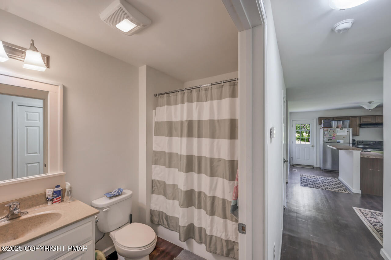 207 Game Lane Blakeslee, PA 18610 - Photo 38 of 55 a bathroom with a sink toilet and shower