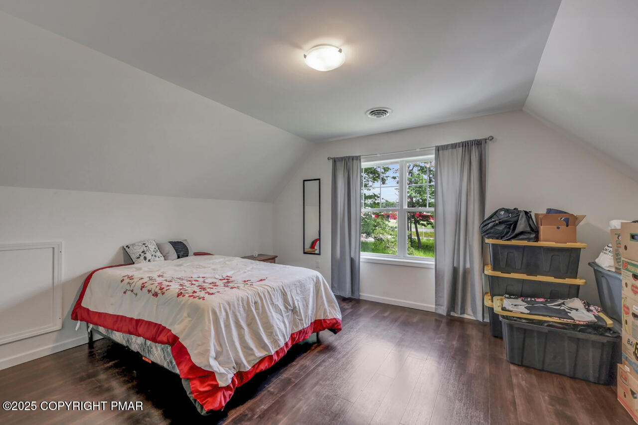 207 Game Lane Blakeslee, PA 18610 - Photo 43 of 55 a bedroom with a bed and a window