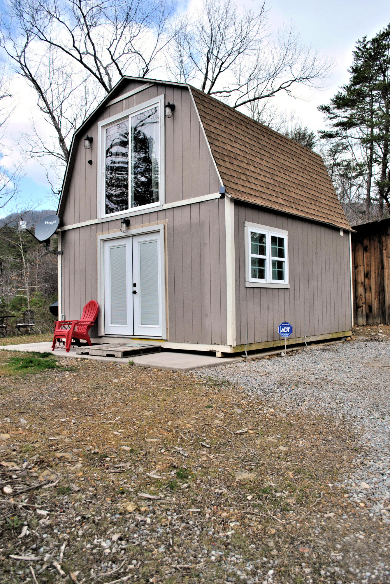 3948 Flatwoods Road Elliston, VA 24087 - Photo 6 of 57 a front view of a house with a yard and garage