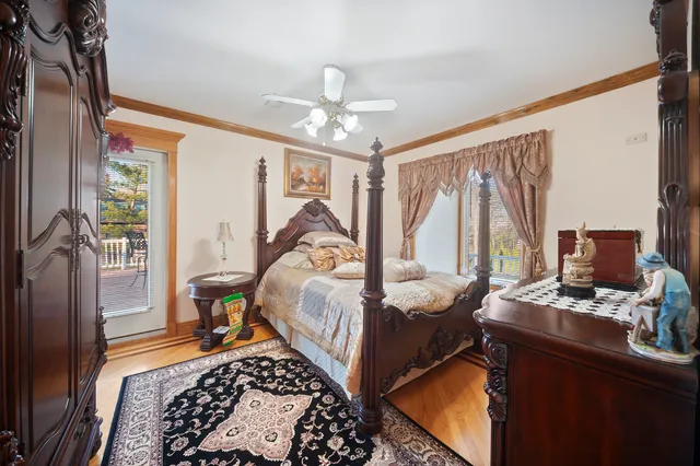 a bed room with furniture and a window