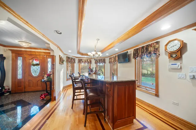 a view of a dining room with furniture window and outside view