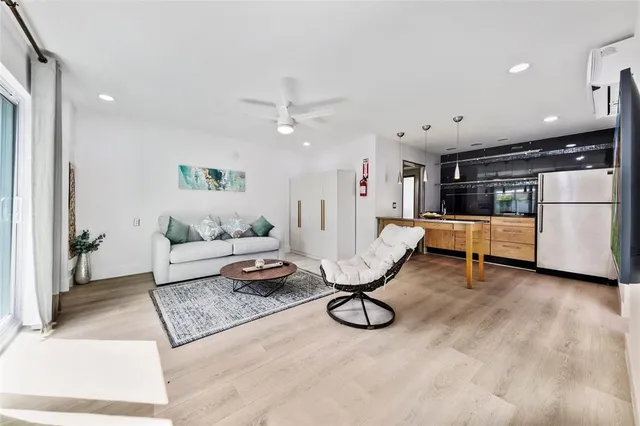 a living room with furniture and a table