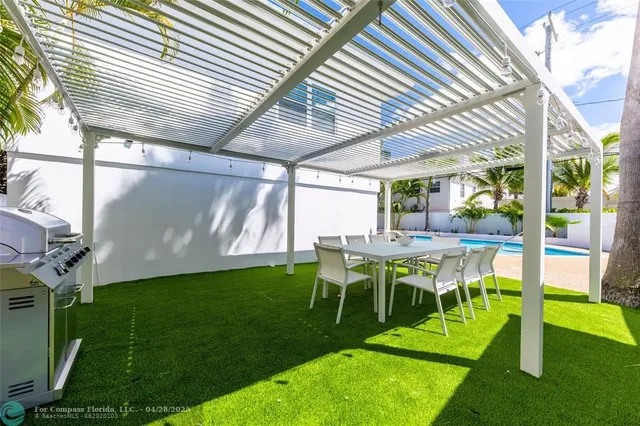 a view of yard with seating space