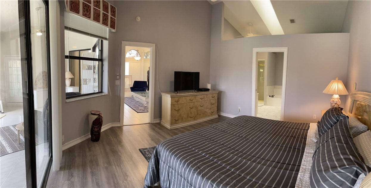 Undisclosed Address Boynton Beach, FL 33472 - Photo 21 of 41 a view of a livingroom with furniture and a flat screen tv