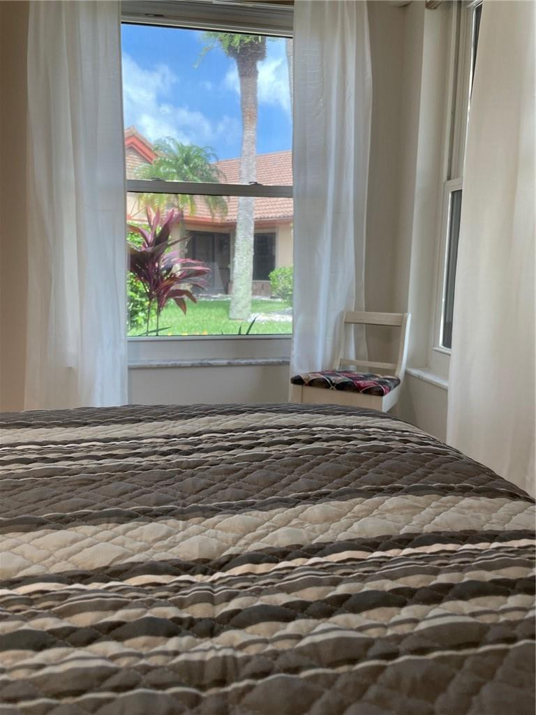 Undisclosed Address Boynton Beach, FL 33472 - Photo 31 of 41 a view of a bedroom from a window