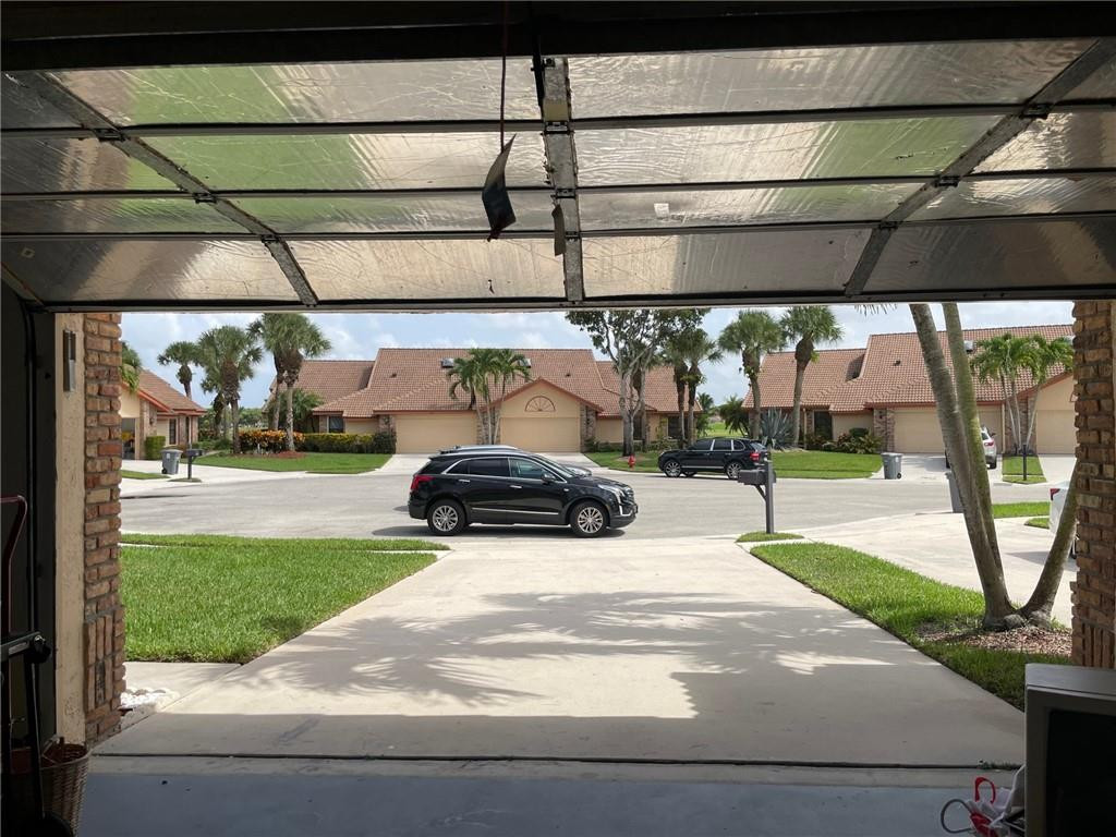 Undisclosed Address Boynton Beach, FL 33472 - Photo 37 of 41 a view of a parking area