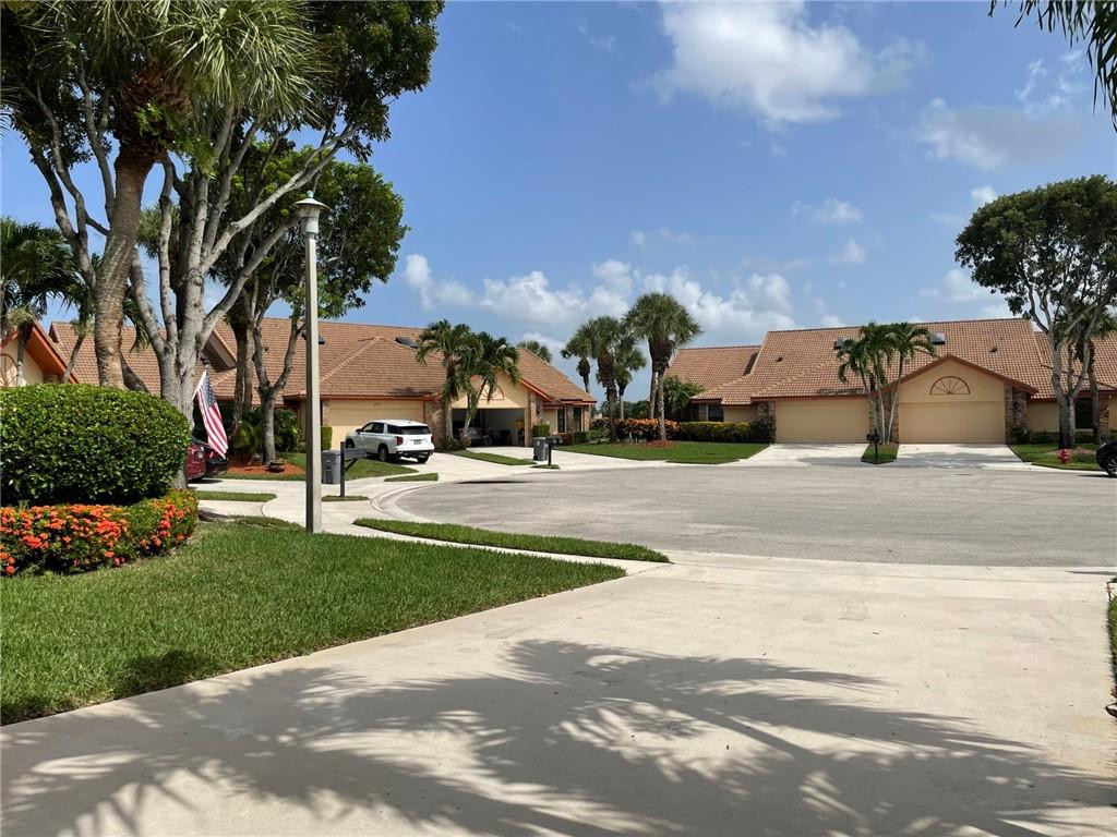 Undisclosed Address Boynton Beach, FL 33472 - Photo 38 of 41 a view of street with houses