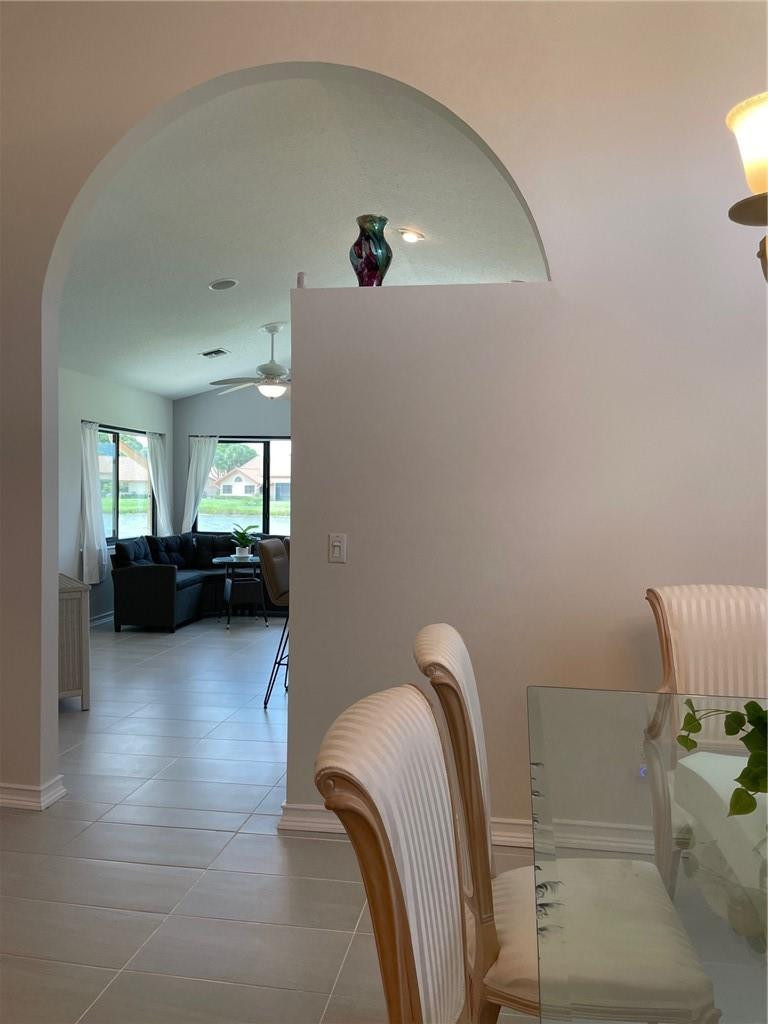 Undisclosed Address Boynton Beach, FL 33472 - Photo 8 of 41 a view of a livingroom with furniture and windows