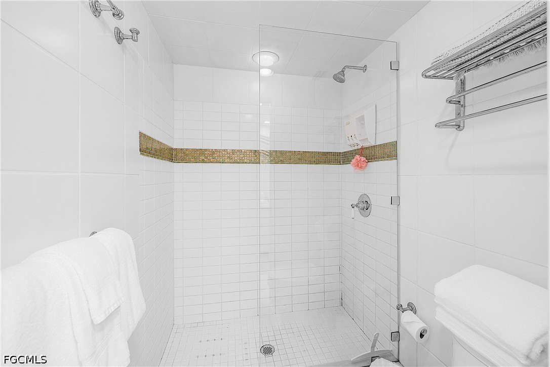 515 Useppa Useppa Island Bokeelia, FL 33922 - Photo 34 of 43 a bathroom with a shower and toilet