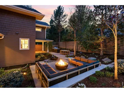 a backyard of a house with seating space
