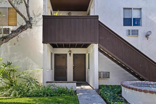 a front view of a house with a garage