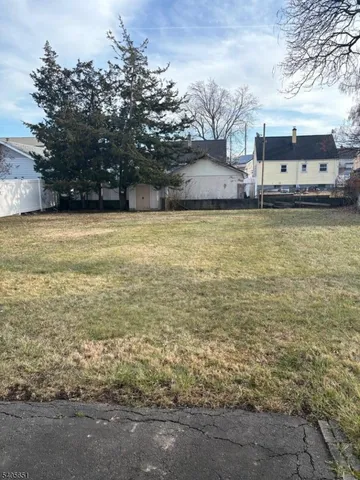 a view of a yard with an outdoor space
