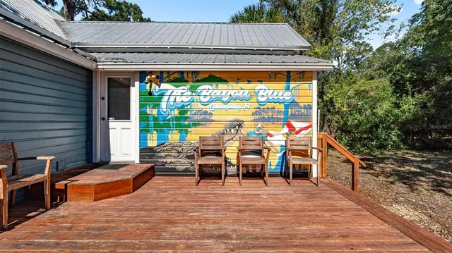 a backyard of a house with seating space