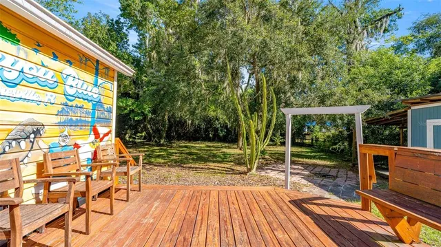 a view of backyard with a small cabin