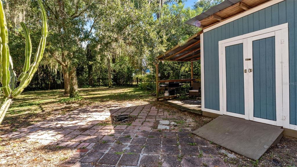 101 Northeast 9th Street Gainesville, FL 32601 - Photo 30 of 35 a view of backyard with cabin